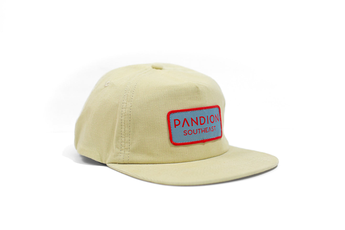 side view of yellow flat billed pandion southeast hat